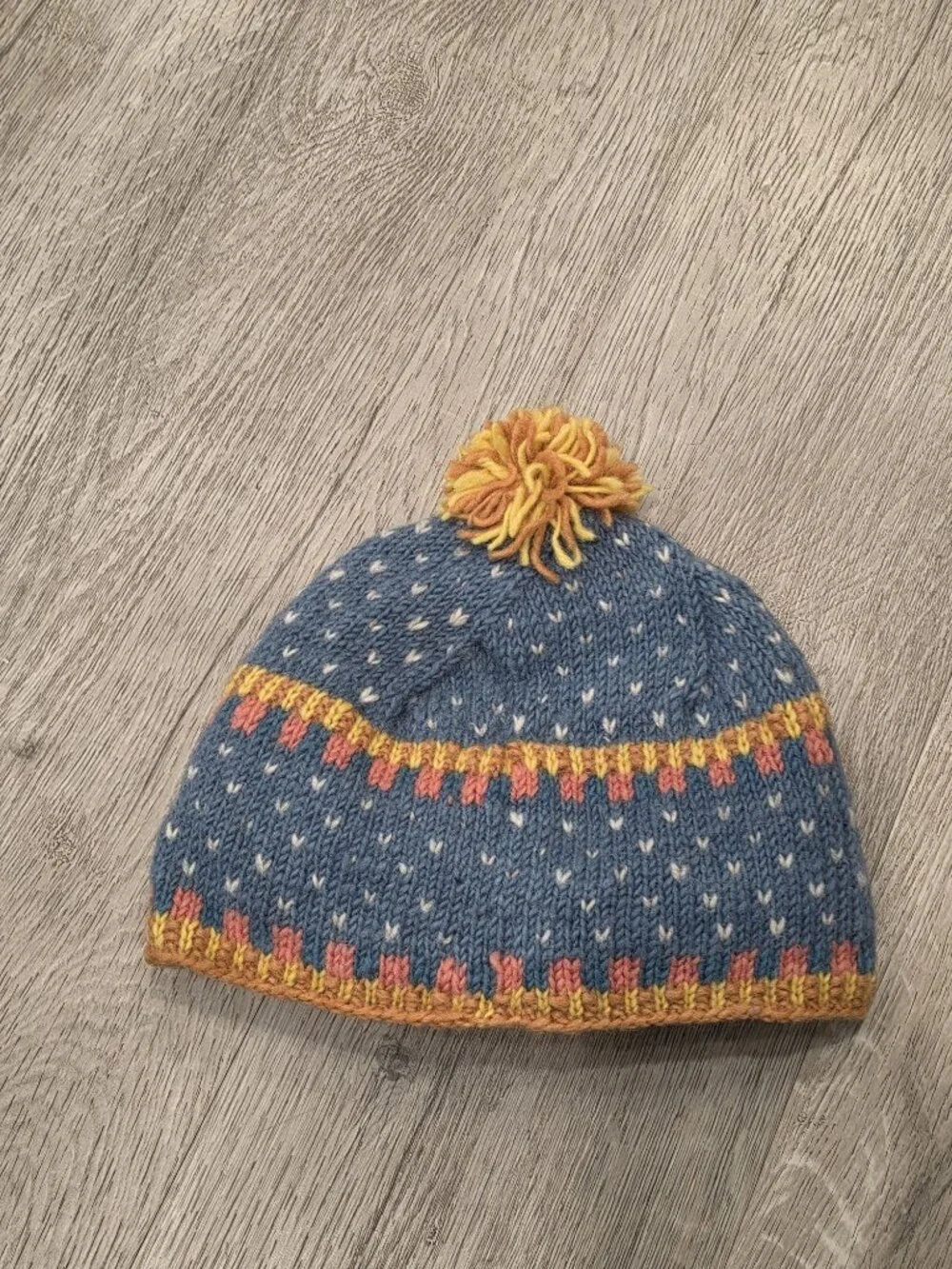 Lost Horizons Hand-Knit Wool Beanie With Floral Embroidery & Pom